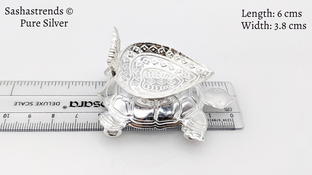 Pure silver heart diya over a turtle - pure silver gift items- silver puja items for home, return gift for navarathri,wedding & housewarming
