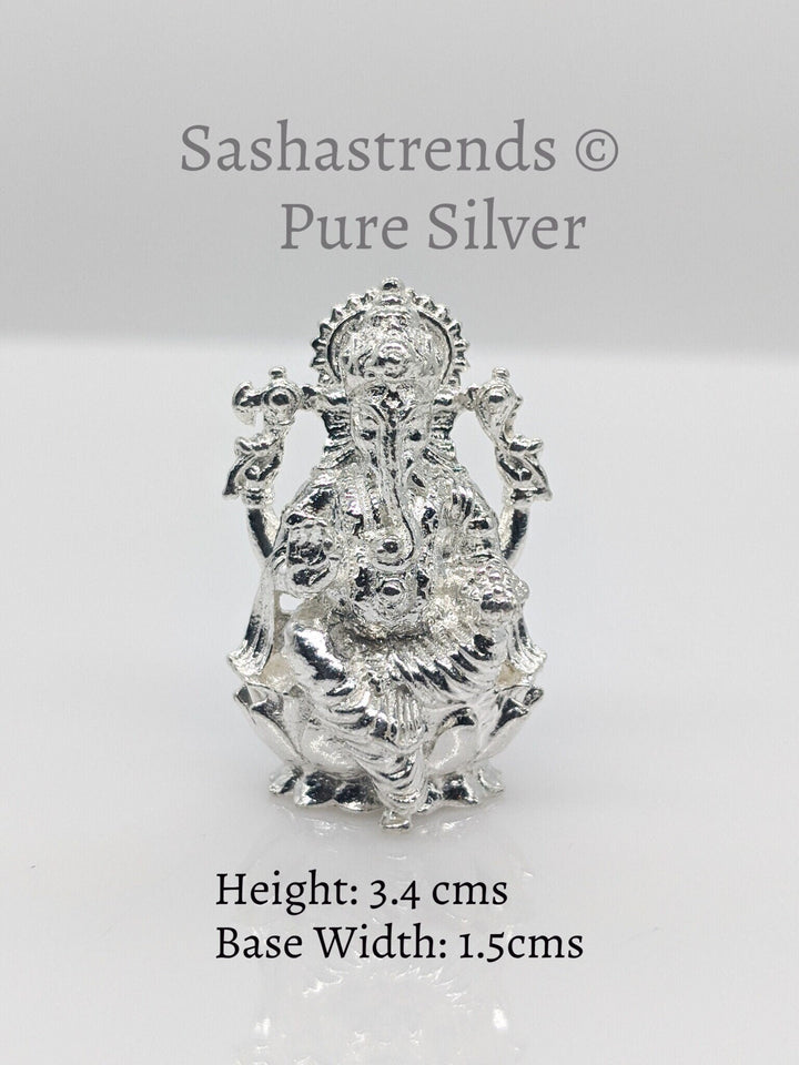 Ganesha idol seated on lotus- pure silver gift items- silver pooja items for home, return gift for navarathri, wedding and housewarming