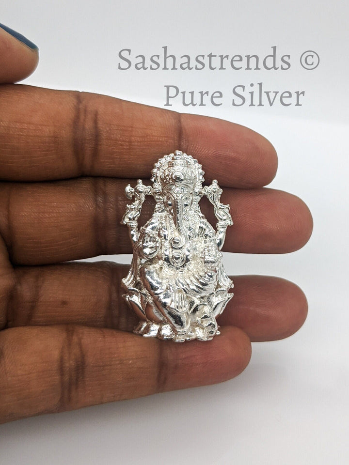 Ganesha idol seated on lotus- pure silver gift items- silver pooja items for home, return gift for navarathri, wedding and housewarming